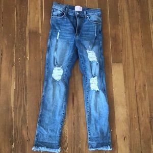 High waisted stretchy ripped jeans